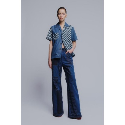 The "patch-mix" flared leg iconic recycled denim pants in blue