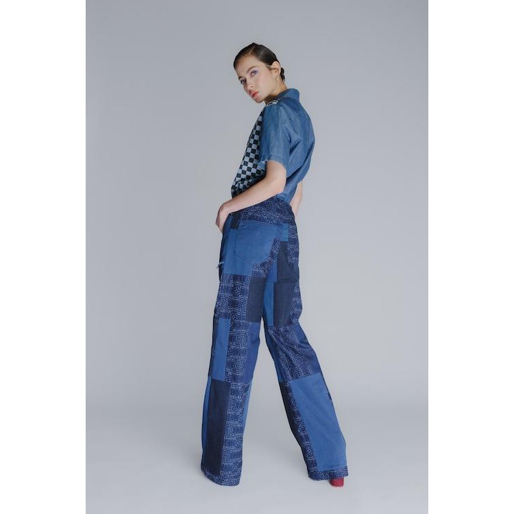 The "patch-mix" flared leg iconic recycled denim pants in blue